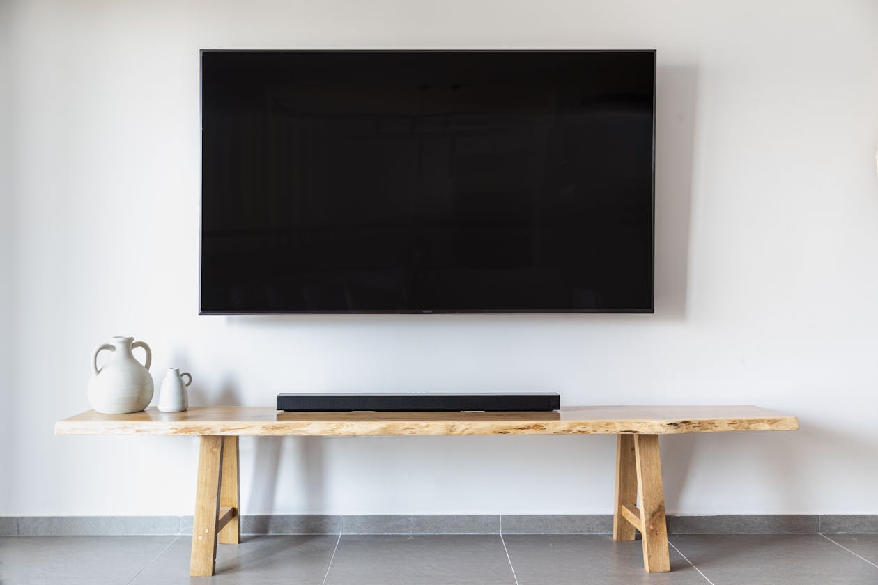 apollo group tv - modern wall-mounted smart TV setup
